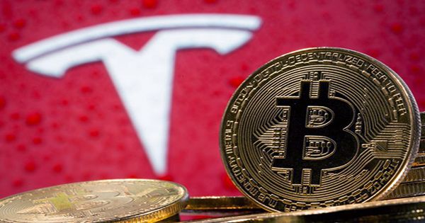Tesla buys $1.5B in bitcoin, may accept the cryptocurrency as payment in the future