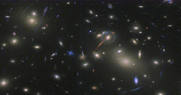 Galaxy Cluster Abell 2813 has so much mass that it acts as a gravitational lens