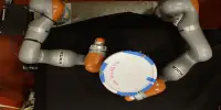 AI enables Robots to Manipulate Items with their Entire Bodies